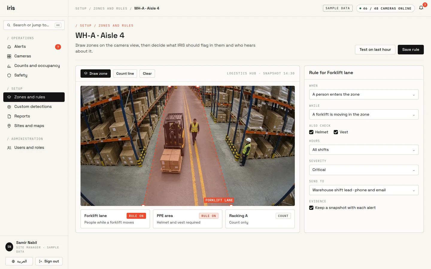 Iris Vision zone and rule setup: a forklift lane drawn on a warehouse camera view, with a rule for people in the lane, helmet and vest checks, severity, and who is notified.